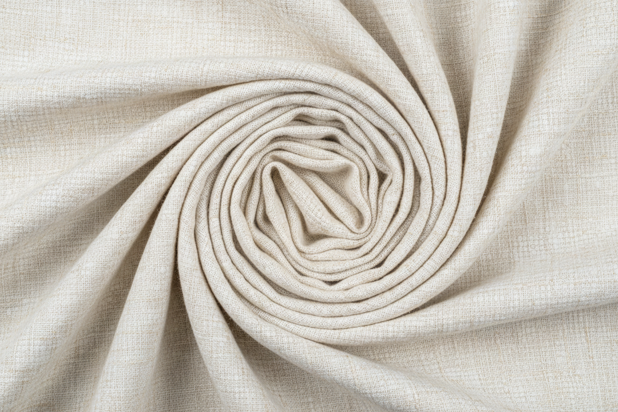High-quality HD photo of checked khaddar fabric, neatly folded in a round swirl shape, made entirely in off-white and cream shades only, no other colors, soft texture clearly visible, realistic lighting, pure white background, minimal shadows, professional textile photography."